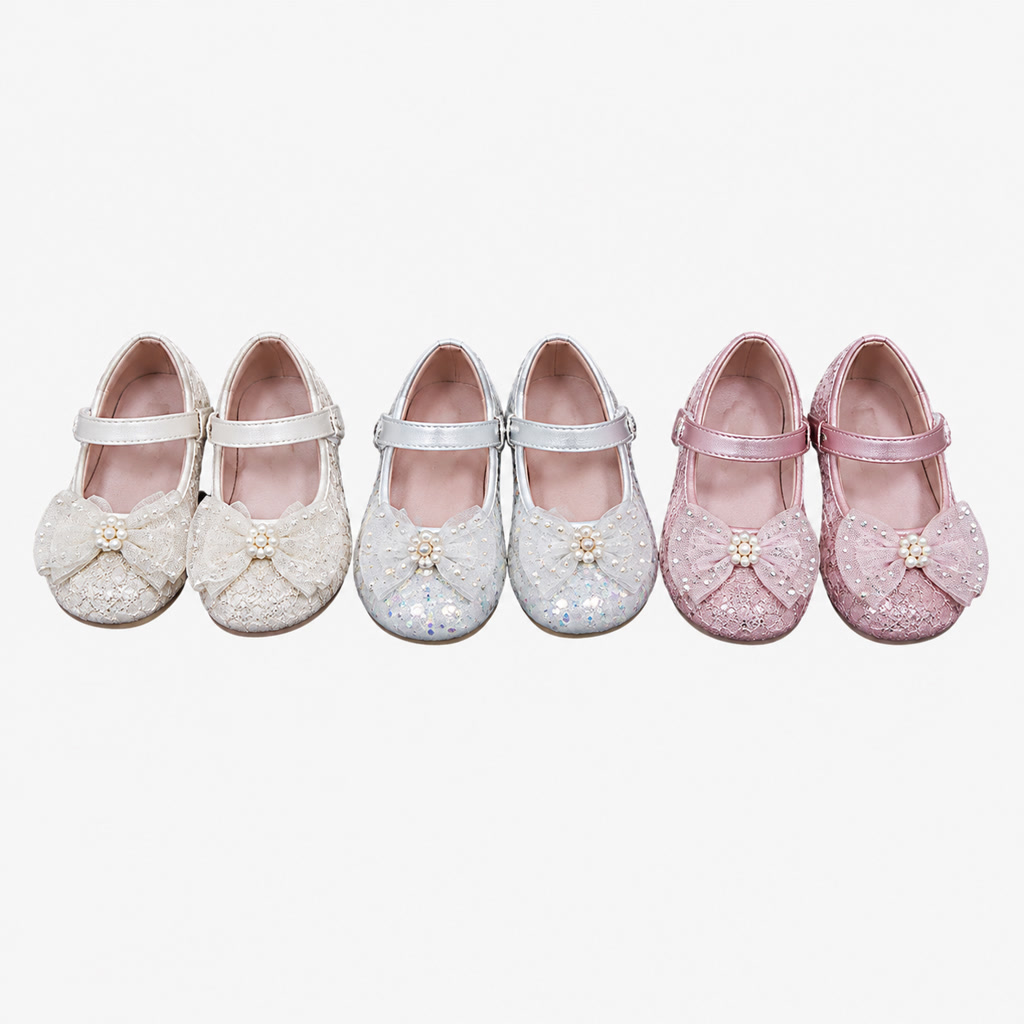Zapato de charol para niña con tira en T y moño