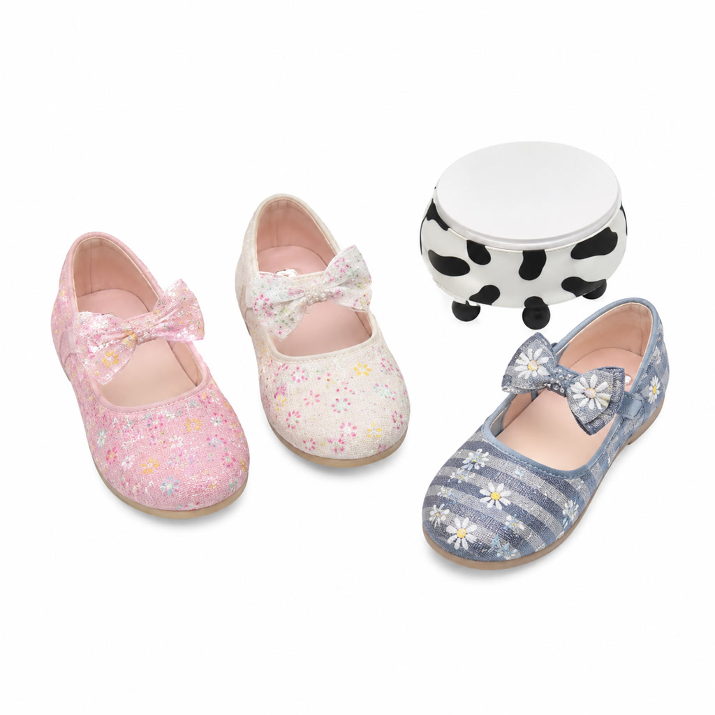 Zapato de charol para niña con moño rayado en contraste